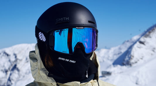 behind the pines helios goggle with smith helmet fit and zeiss lens lifestyle shot in hintertux glacier