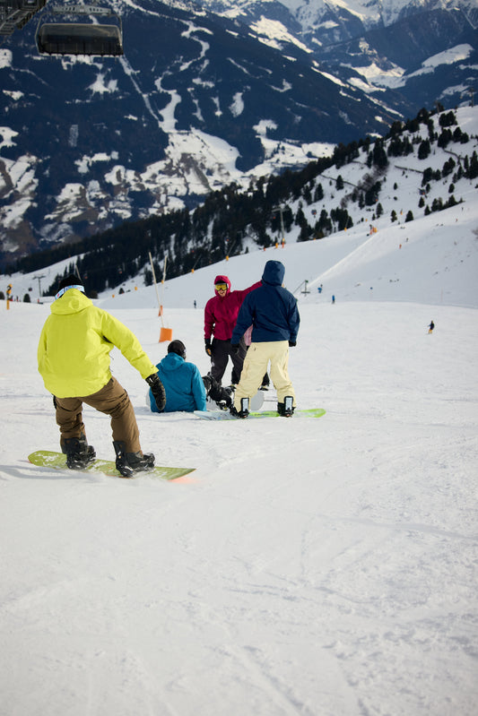 Snowboarder on a European mountain ski resort – Behind The Pines