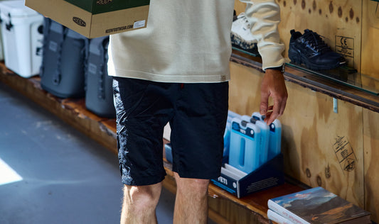 gramicci packable g short banner behind the pines in store