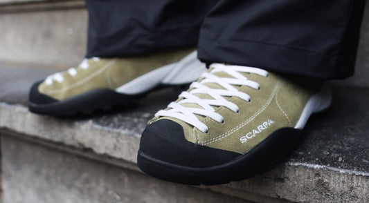 scarpa mojito sage on foot on a ledge