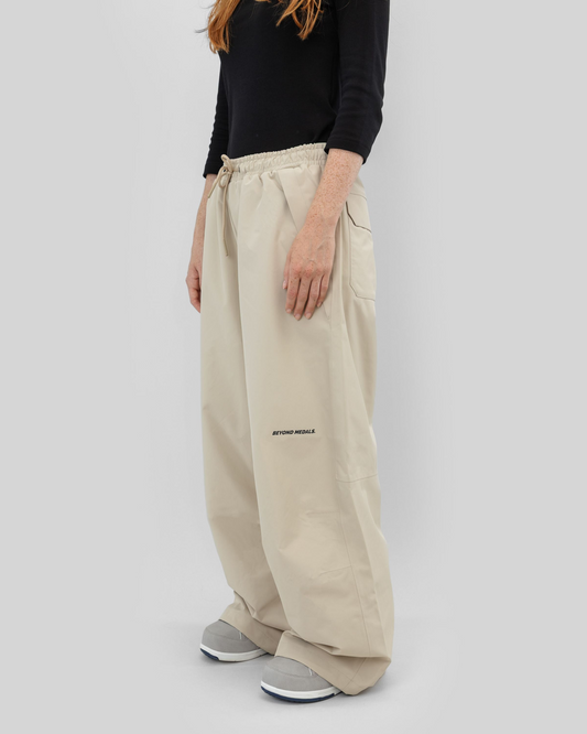 Beyond Medals Park Pants 2L Beige – three-quarter view