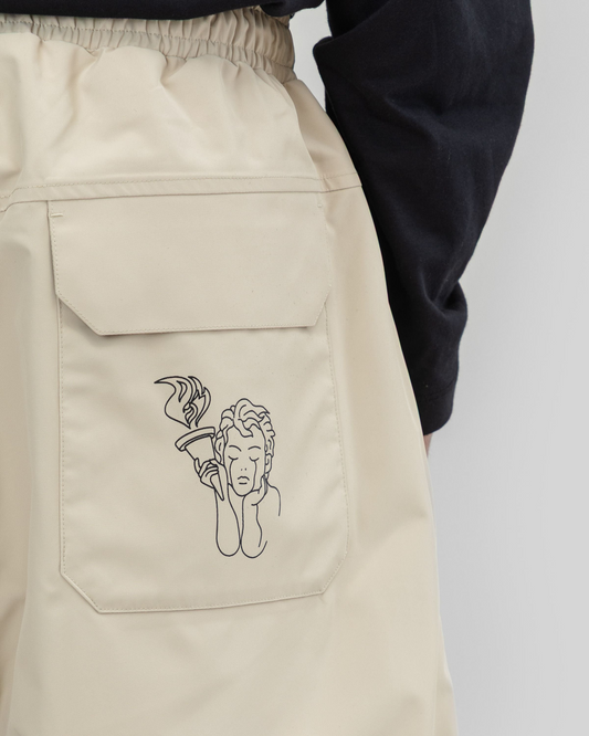 Beyond Medals Park Pants 2L Beige – logo detail