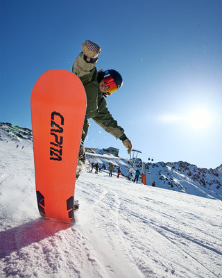 Casker Wolf doing an ollie on the Capita Mercury 2027 Snowboard
