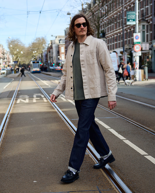 Nudie Jeans Rad Rufus Blue One Wash lifestyle shot amsterdam behind the pines