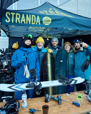 Stranda Makrill Snowboard behind the pines with Stranda Crew