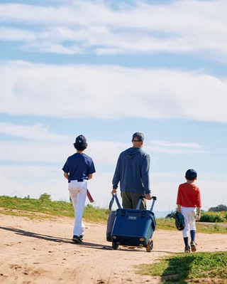 YETI Roadie 32 Wheeled Cooler Light Blue – Mobile Ice Chest with Permafrost™ Insulation